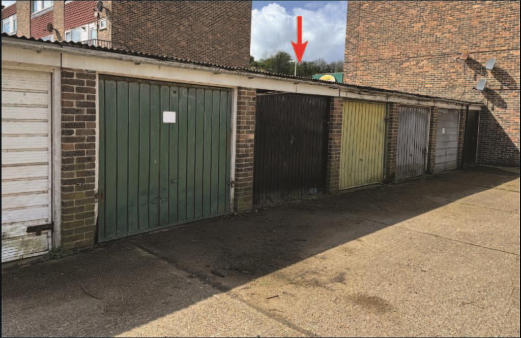 Lot: 51 - FREEHOLD LOCK-UP GARAGE - garage with black door